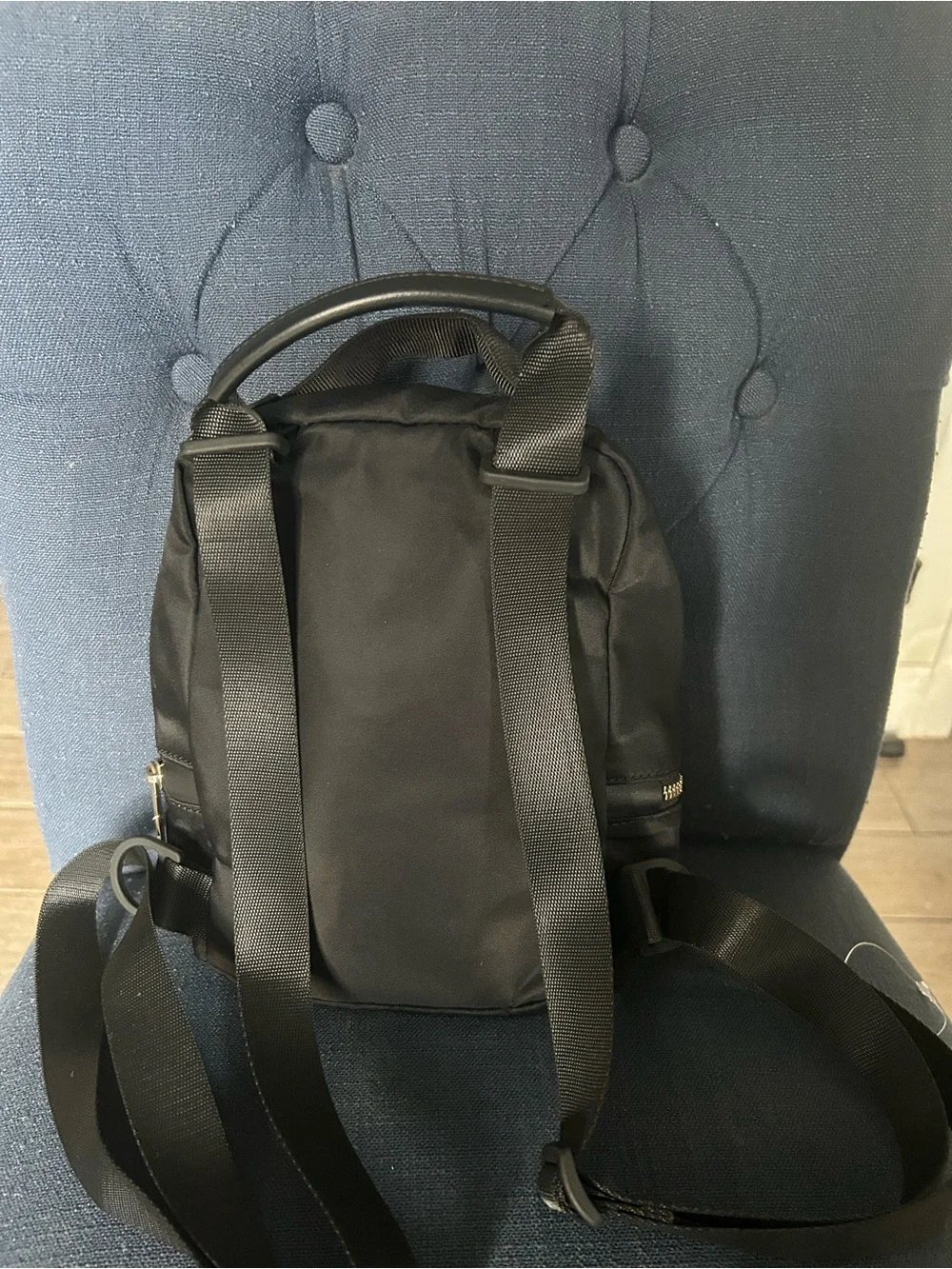 Lululemon City Adventurer Backpack Micro 3L in Black with Gold hardware.